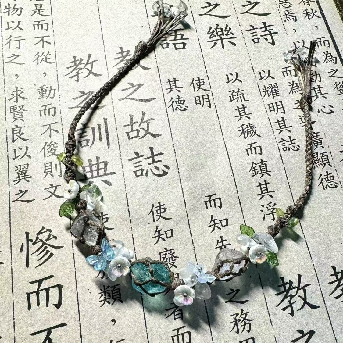 Glacier blue crystal flower braided bracelet