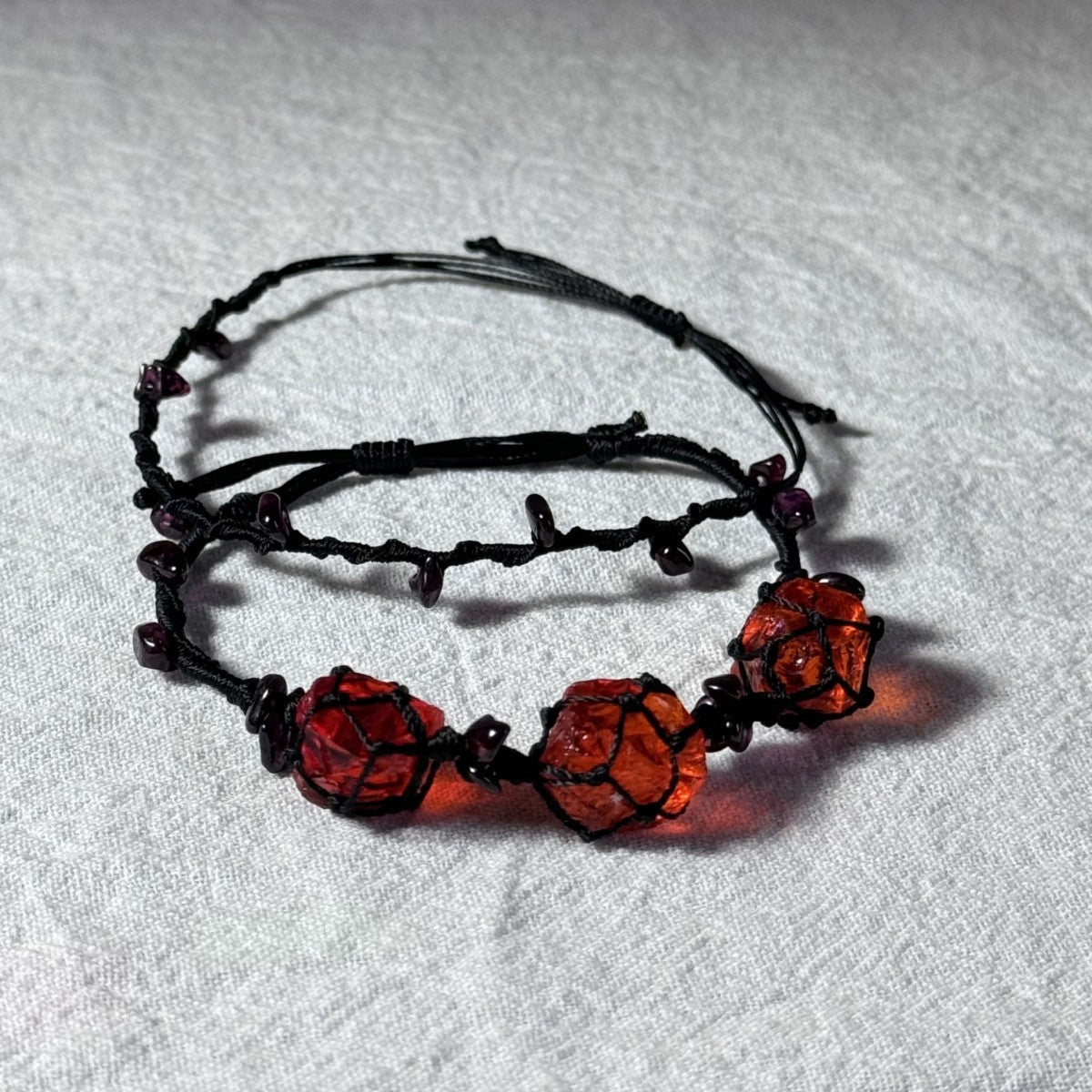 Original garnet bracelet with red glass beads and hand-woven design