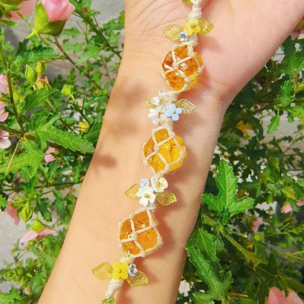 Yellow glazed handmade braided bracelet