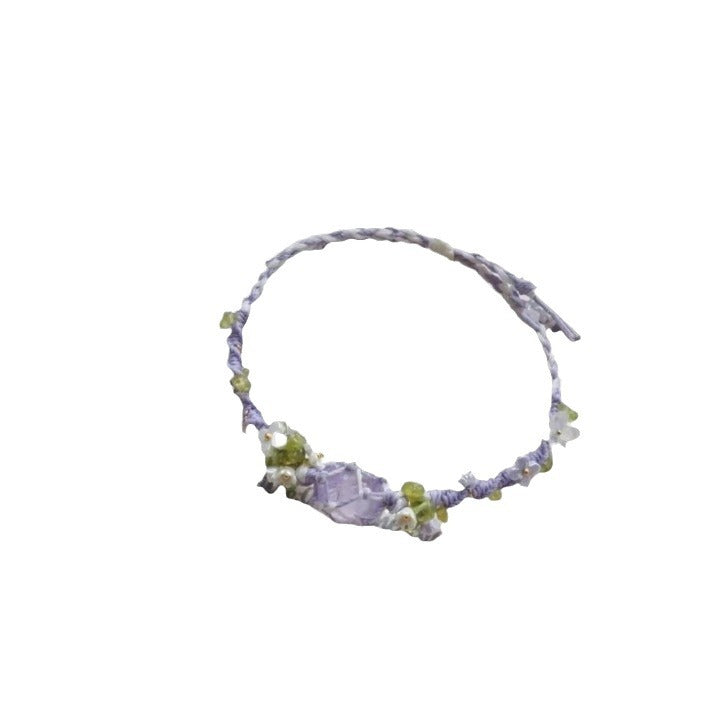 Handmade braided bracelet with purple fluorite crystal