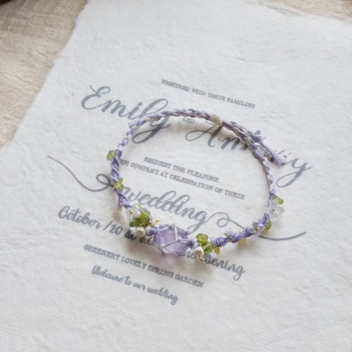 Handmade braided bracelet with purple fluorite crystal