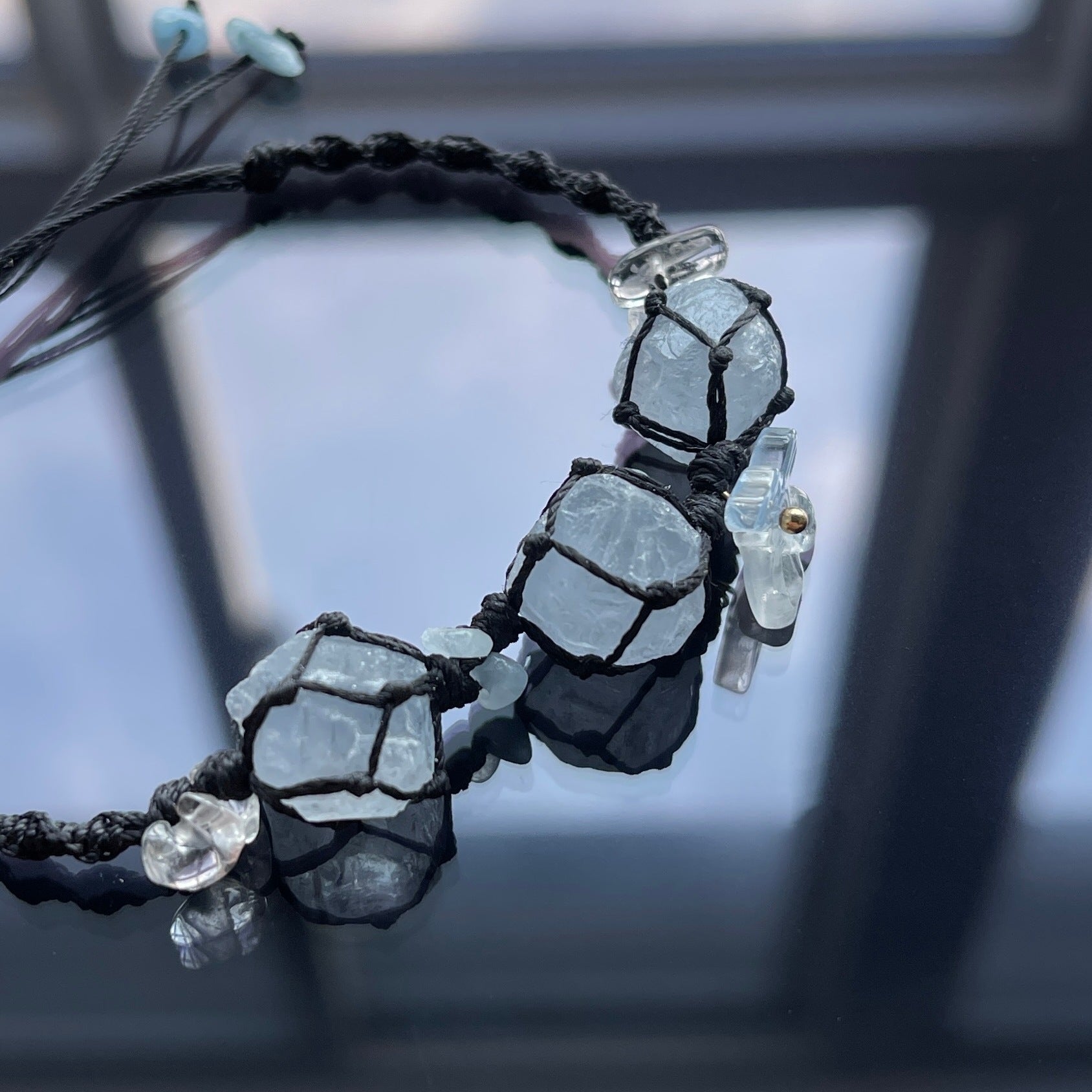 Handmade crystal bracelet with blue fluorite and floral accents - a touch of nature