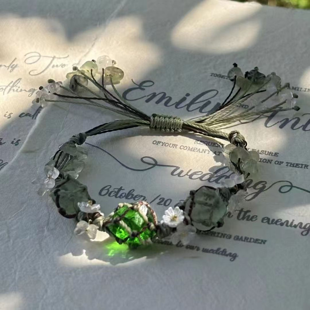 Handmade braided bracelet with green glass beads and green fluorite beads