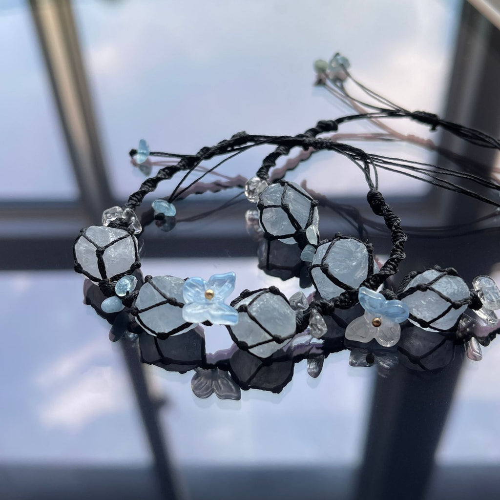 Handmade crystal bracelet with blue fluorite and floral accents - a touch of nature
