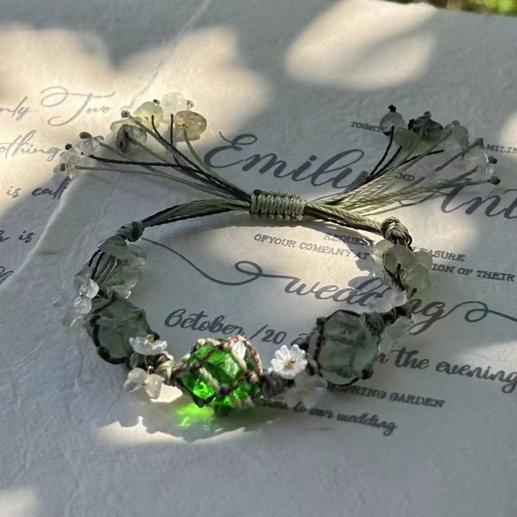Handmade braided bracelet with green glass beads and green fluorite beads