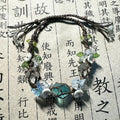 Glacier blue crystal flower braided bracelet