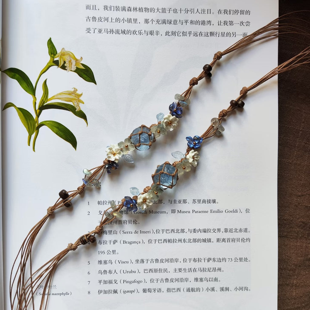 Blue crystal braided flower bracelet