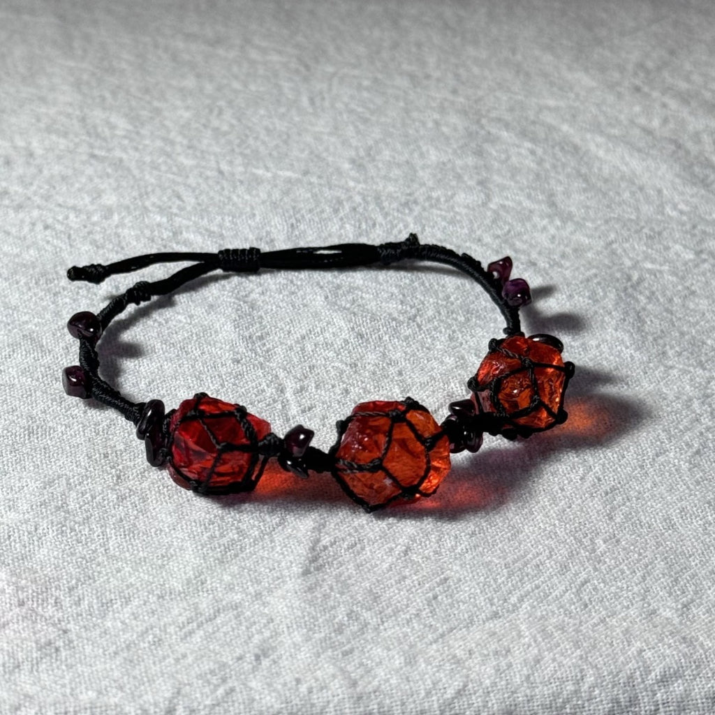 Original garnet bracelet with red glass beads and hand-woven design