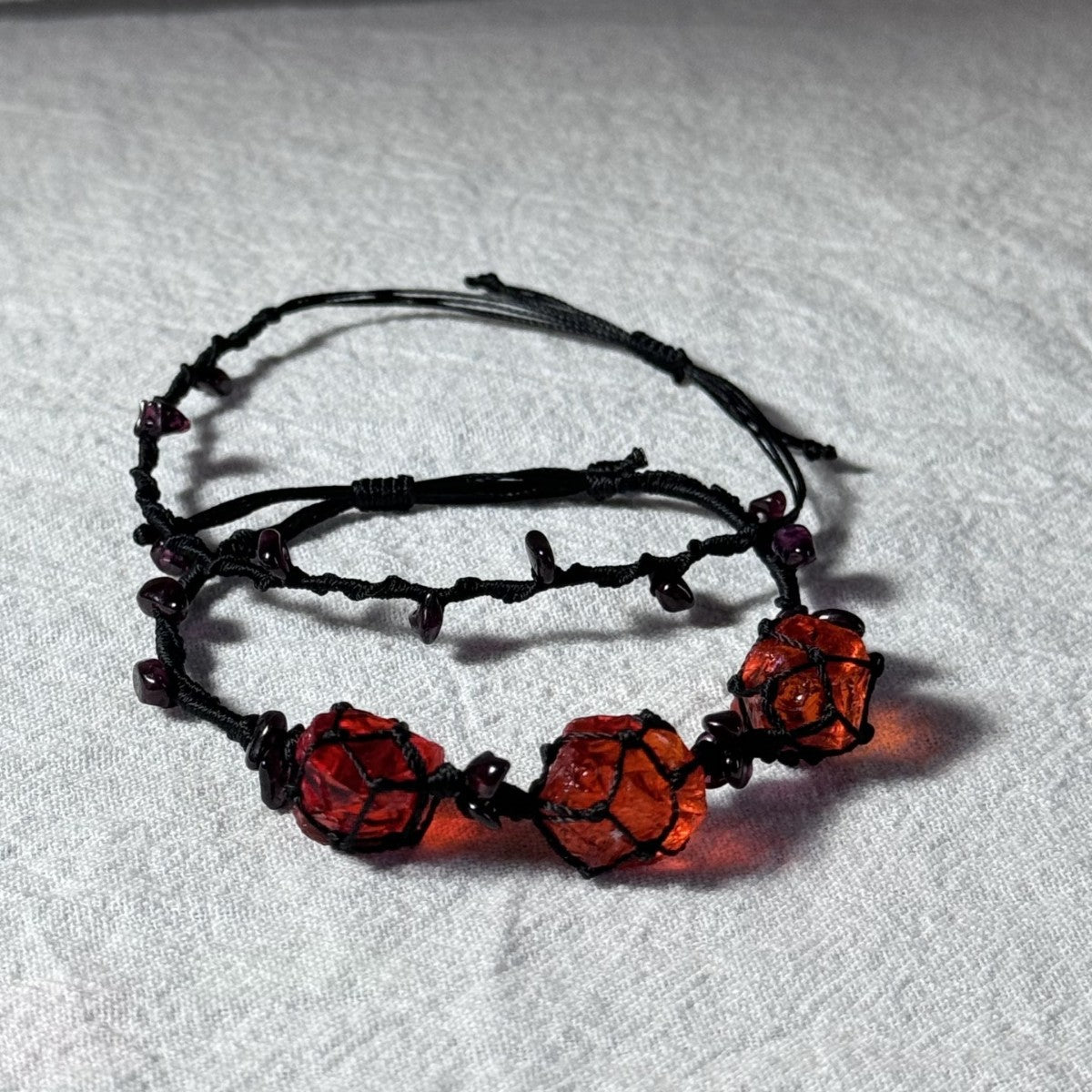 Original garnet bracelet with red glass beads and hand-woven design