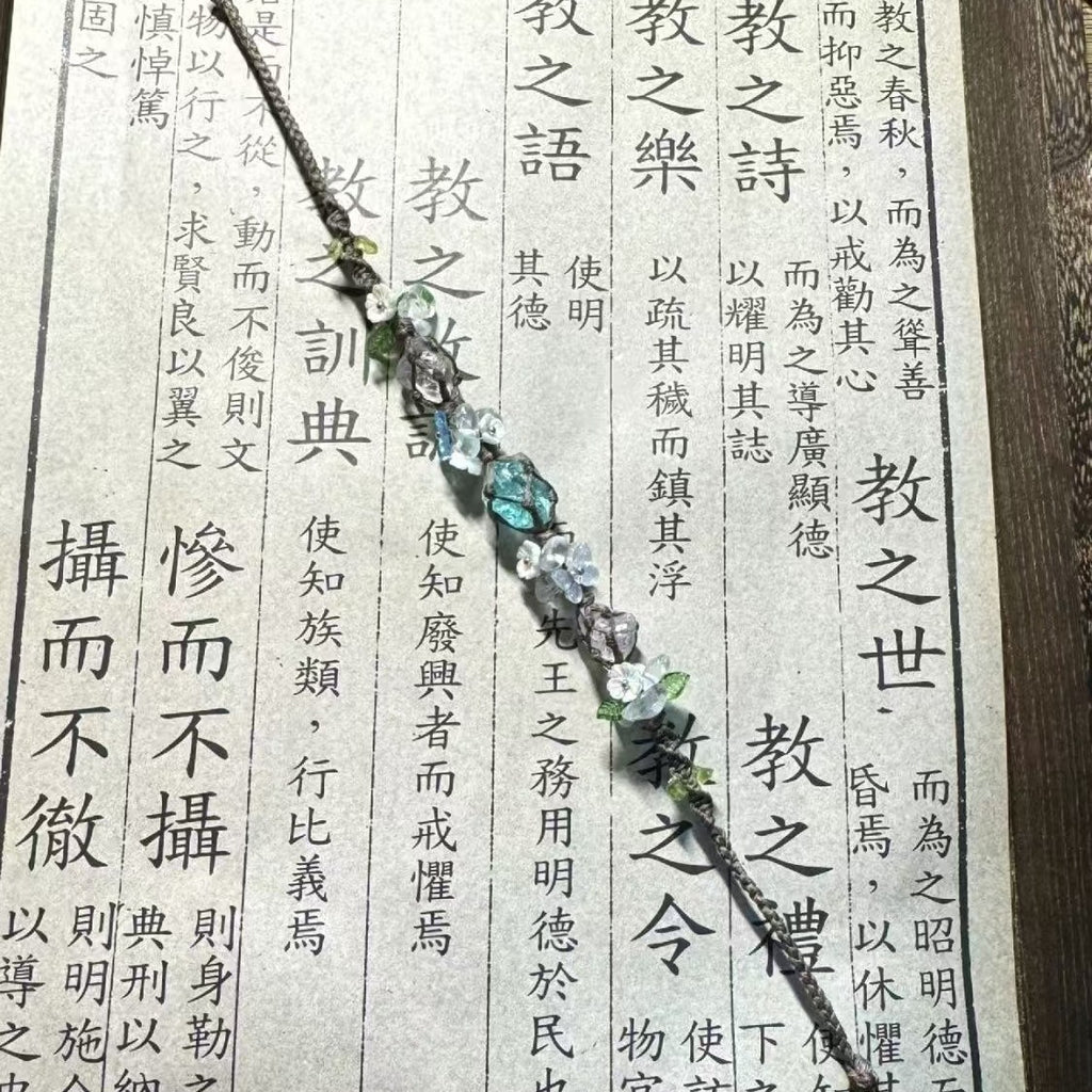 Glacier blue crystal flower braided bracelet