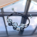 Handmade crystal bracelet with blue fluorite and floral accents - a touch of nature