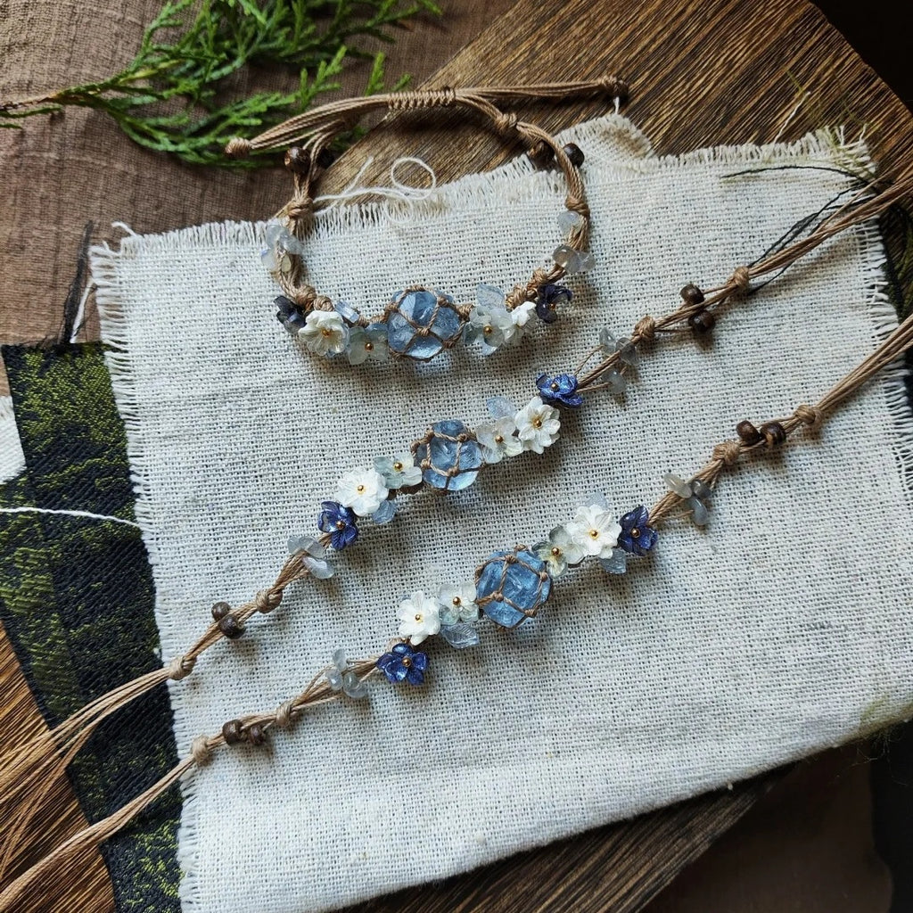 Blue crystal braided flower bracelet