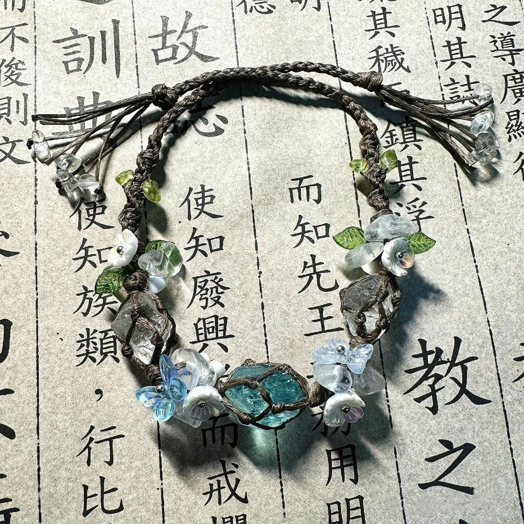 Glacier blue crystal flower braided bracelet